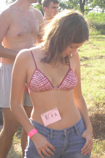 Young teen girl showing