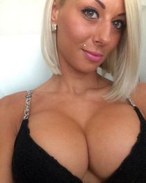 Busty tan brunette milf
